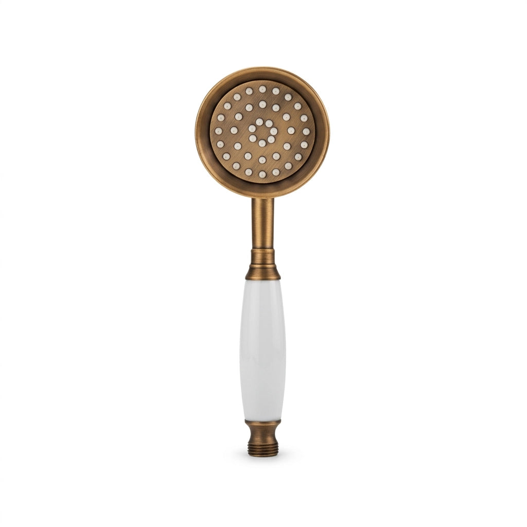 Pommeau de douche doré brossé vintage à buse vu de face sur fond blanc