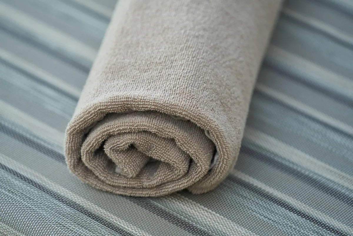 Serviette de bain roulée