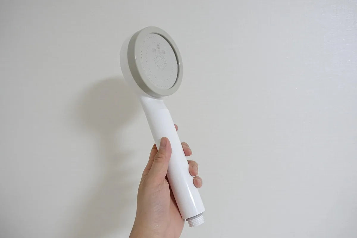 Pommeau de douche à main blanc