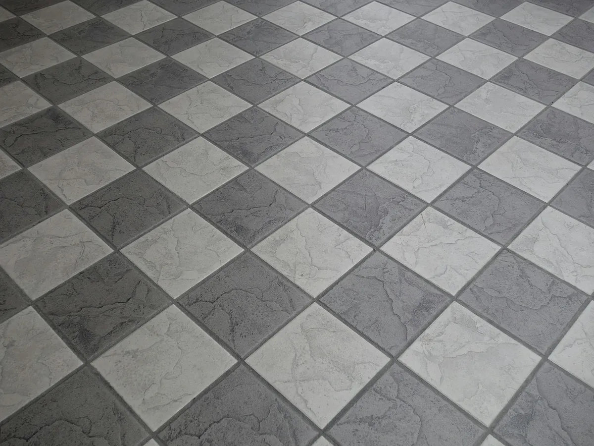 Carrelage mural à motif damier gris